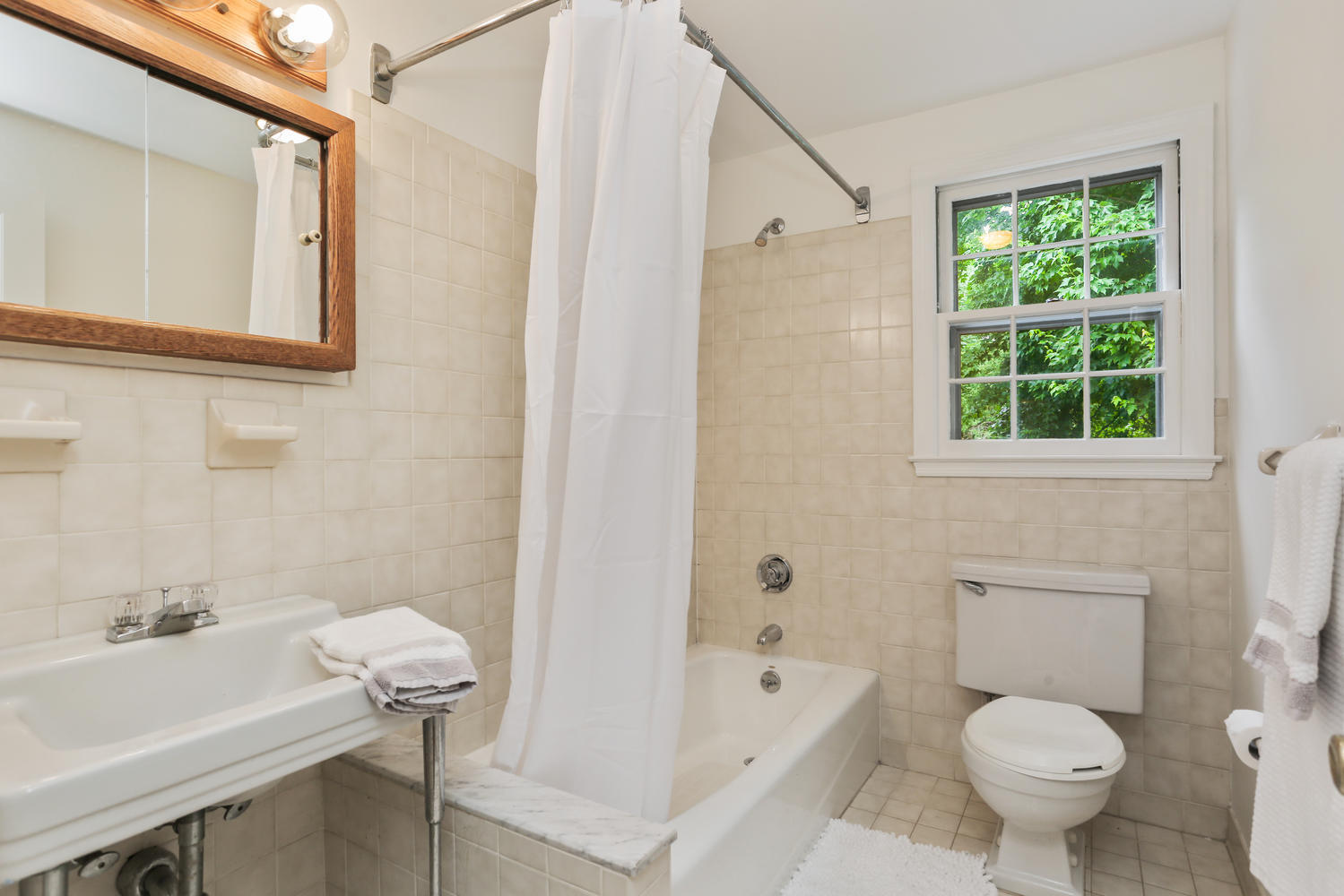 9 Alpine Lane Darien, CT 06820 - Photo 17 of 23 a bathroom with a sink toilet and shower
