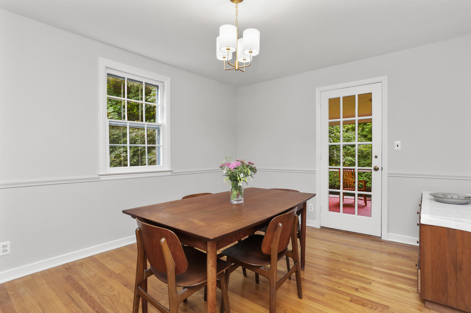 9 Alpine Lane Darien, CT 06820 - Photo 6 of 23 a view of a dining room with furniture window and wooden floor