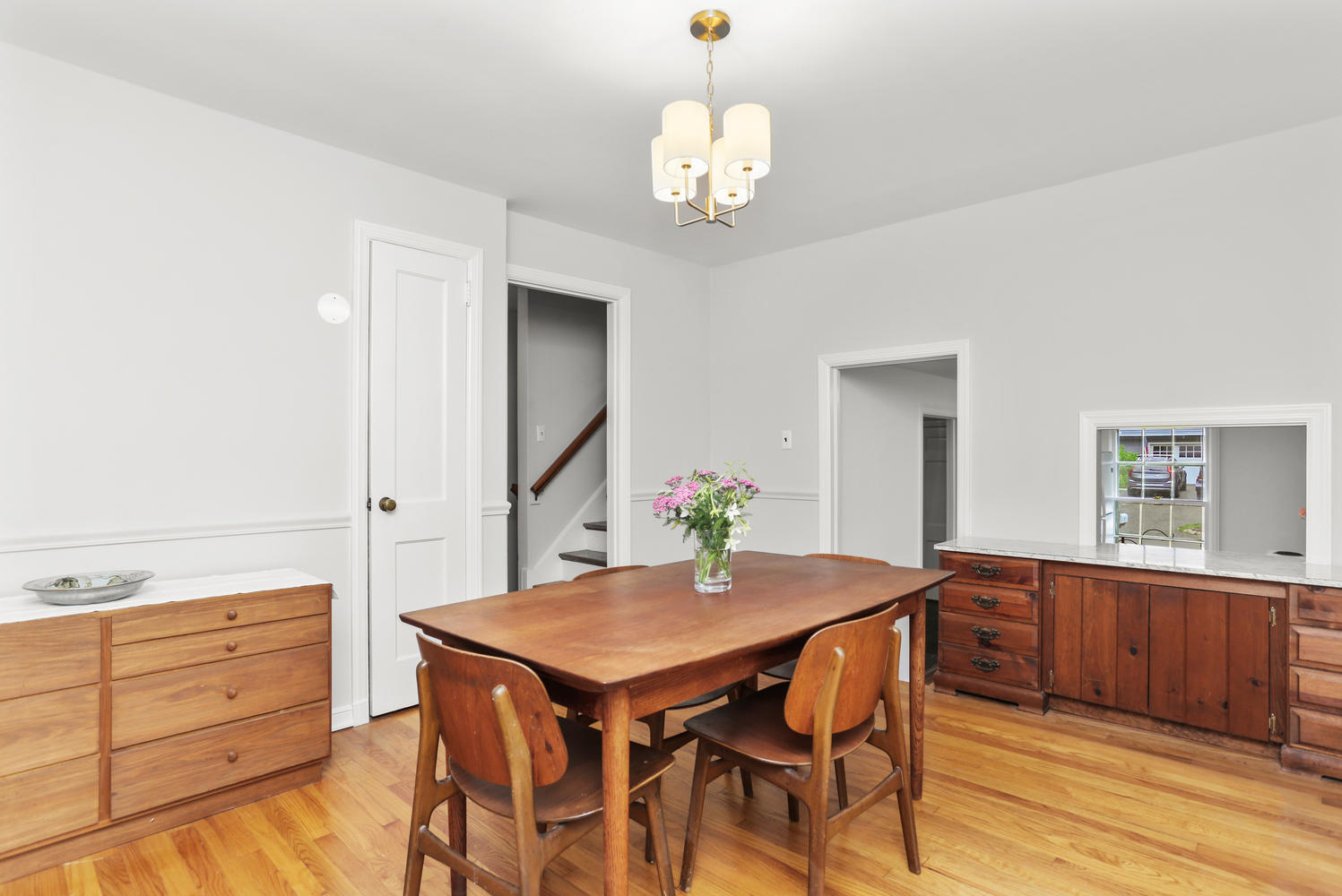 9 Alpine Lane Darien, CT 06820 - Photo 7 of 23 a view of a dining room with furniture and wooden floor