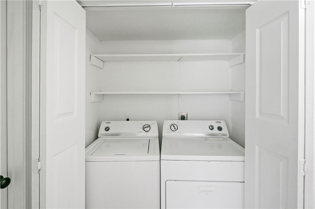 1503 Alpine Circle, Unit A College Station, TX 77840 - Photo 18 of 18 a utility room with dryer and washer