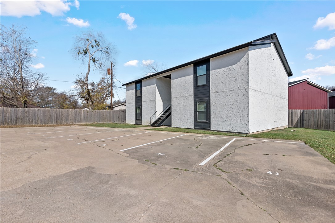 1503 Alpine Circle, Unit A College Station, TX 77840 - Photo 2 of 18 a view of backyard and garage