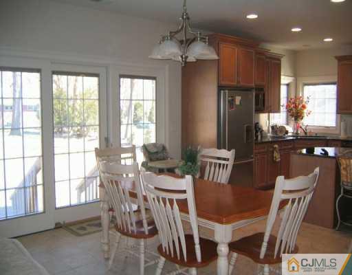 3 Skytop Road Edison, NJ 08820 - Photo 4 of 8 a view of a dining room with furniture window and outside view