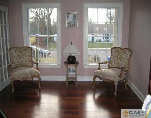 3 Skytop Road Edison, NJ 08820 - Photo 5 of 8 a living room with furniture and a large window