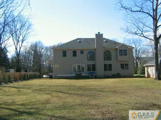 3 Skytop Road Edison, NJ 08820 - Photo 8 of 8 a front view of building with yard