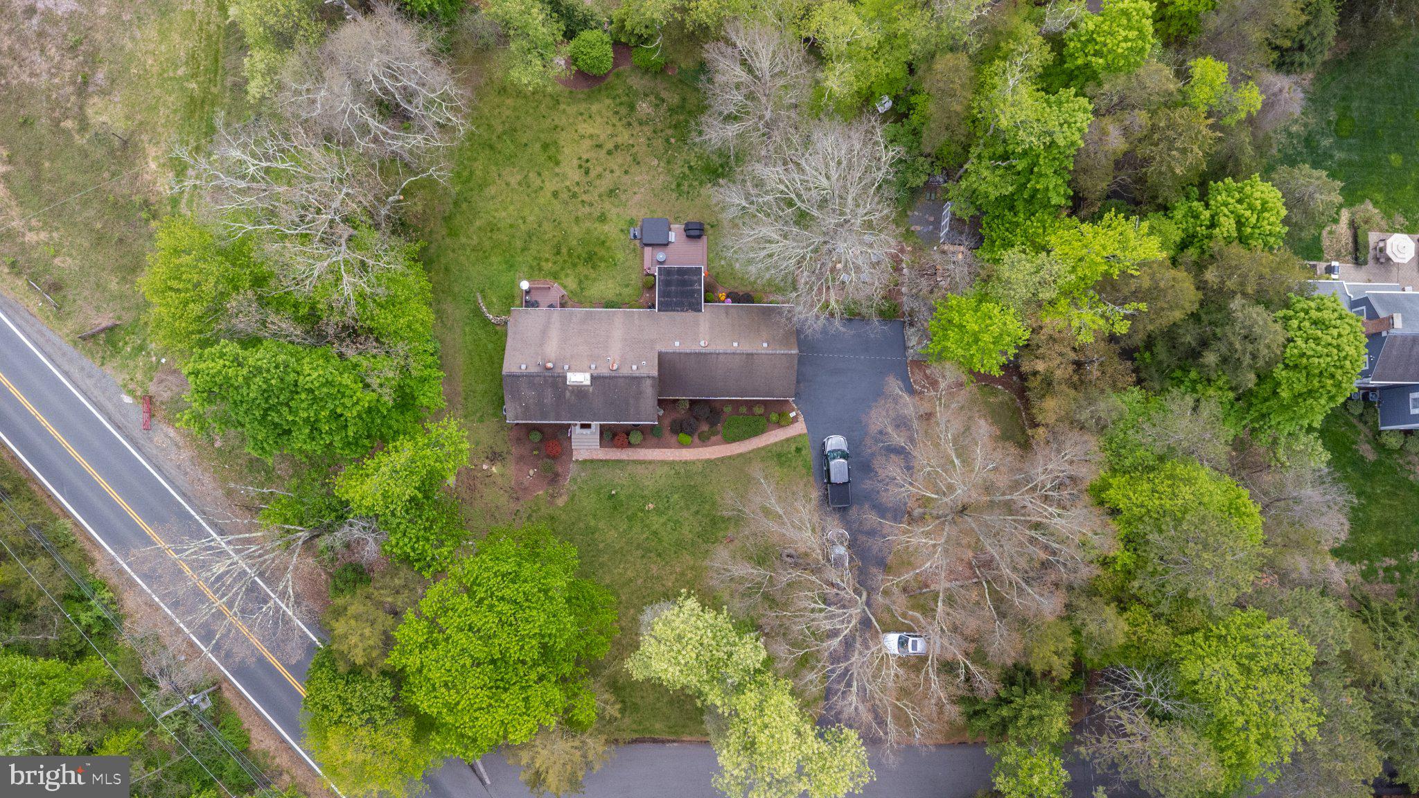 1 W Road Boonton, NJ 07005 - Photo 4 of 45 Serene home nestled in lush greenery.