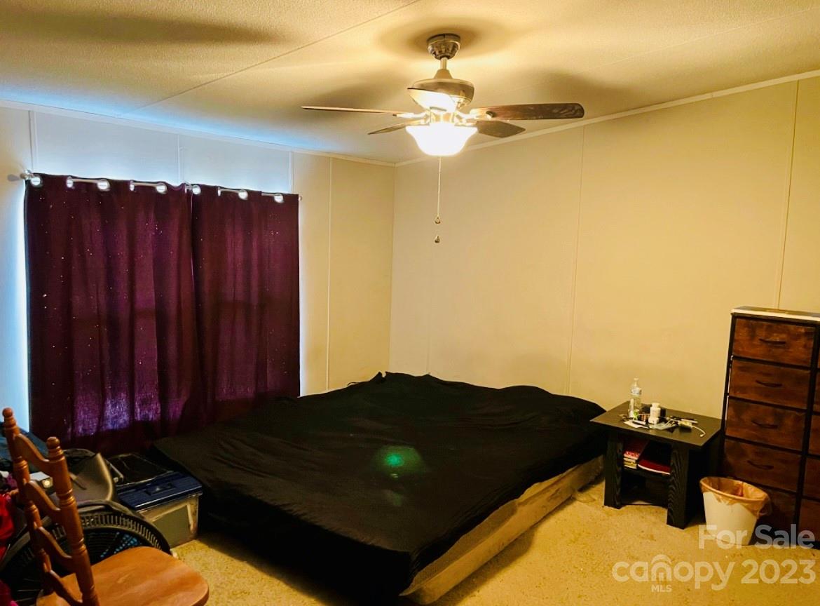 942 Stone Throw Drive Concord, NC 28025 - Photo 4 of 9 a black leather couches in a room