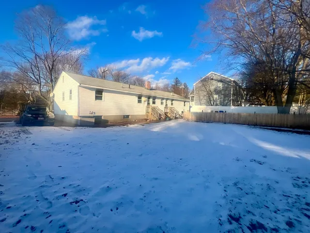 a view of open space with a big yard