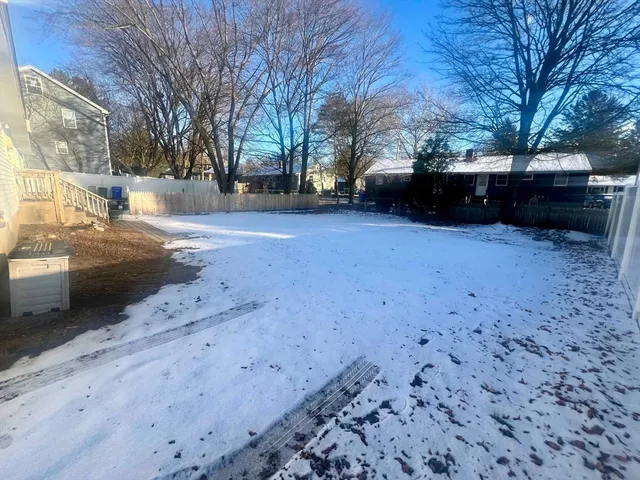 a view of road with with car parked