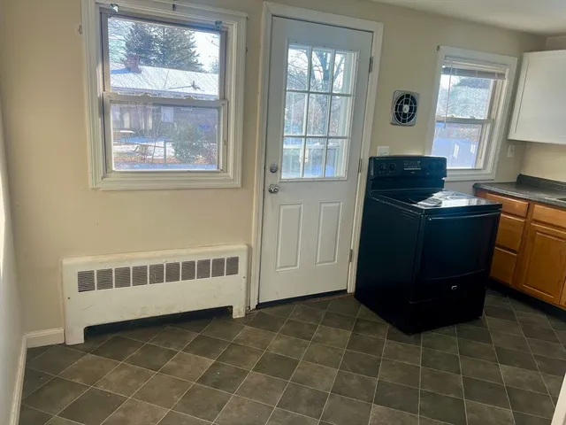 a view of kitchen with windows