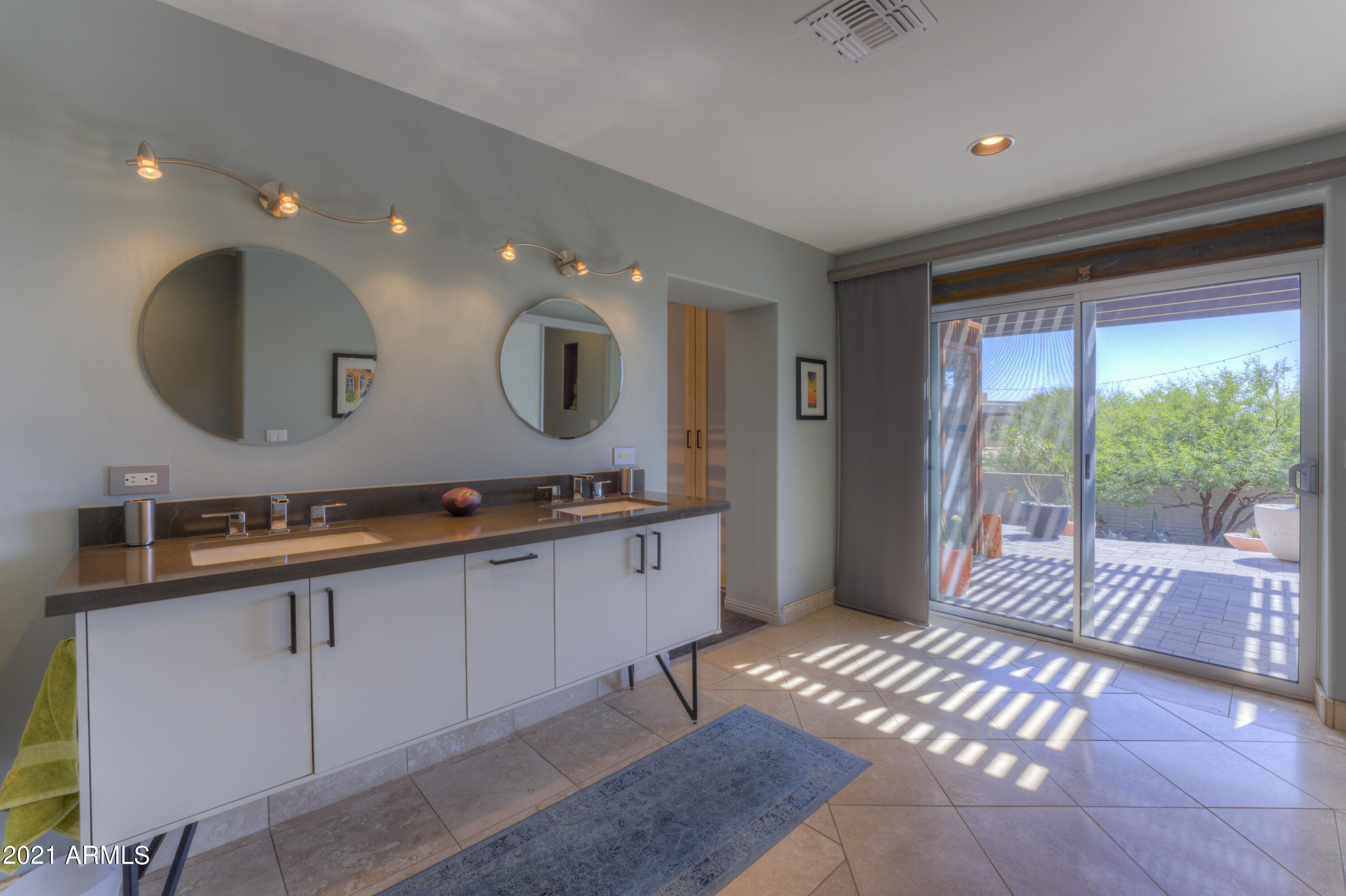 9535 Romping Road Carefree, AZ 85377 - Photo 41 of 61 Doors to outdoor shower