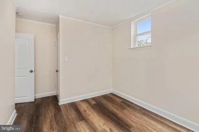 a view of small space with wooden floor