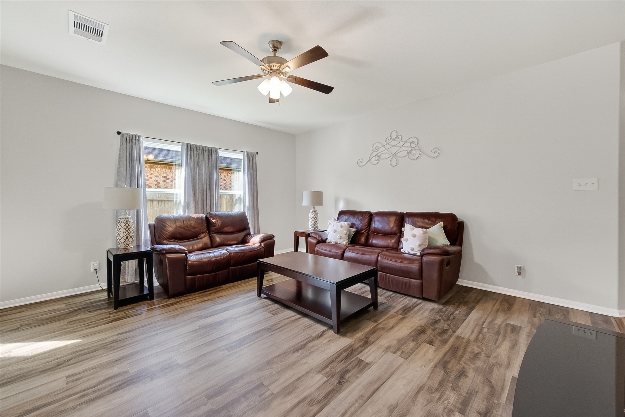 8630 Willet Street Baytown, TX 77521 - Photo 5 of 49 family room with natural light