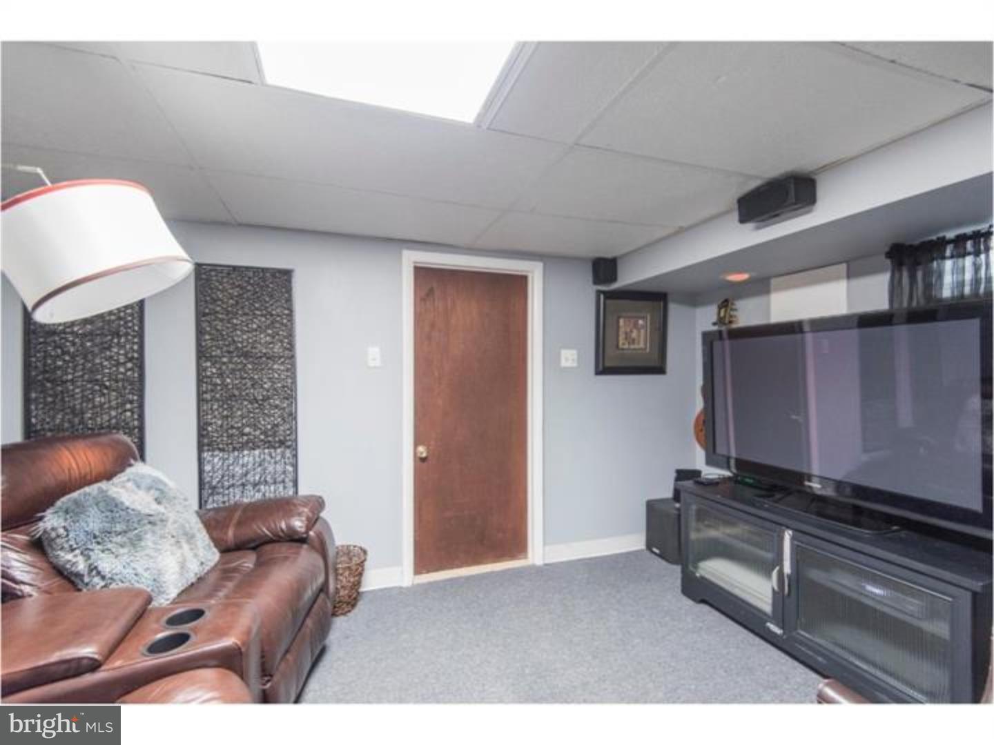 6817 Ridge Avenue Philadelphia, PA 19128 - Photo 14 of 22 a living room with furniture