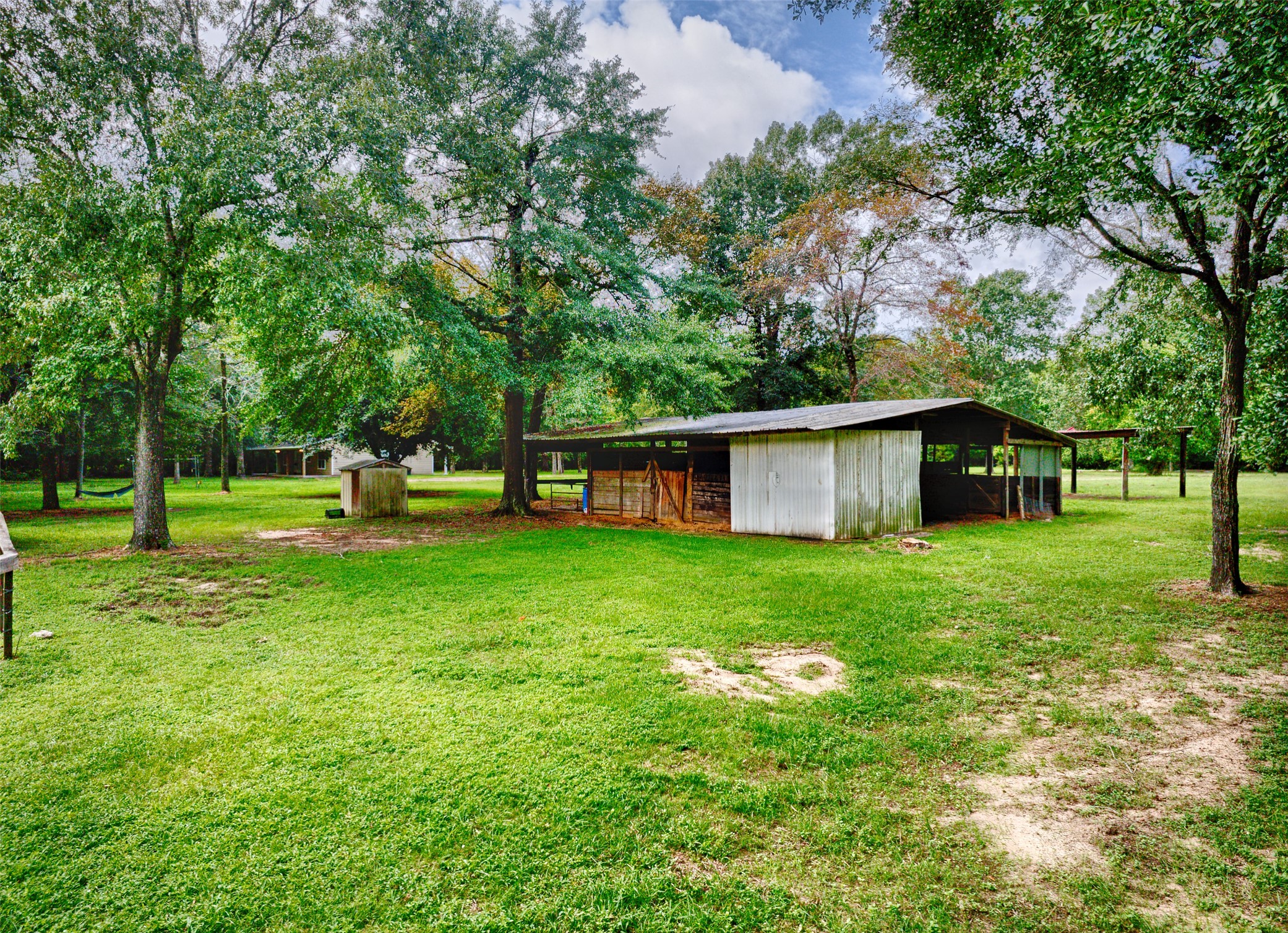 3131 Sapp Road Conroe, TX 77304 - Photo 38 of 48 a view of a house with a yard