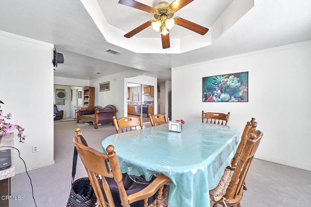 9494 Baker Road Lucerne Valley, CA 92356 - Photo 39 of 56 a dining room with furniture and window