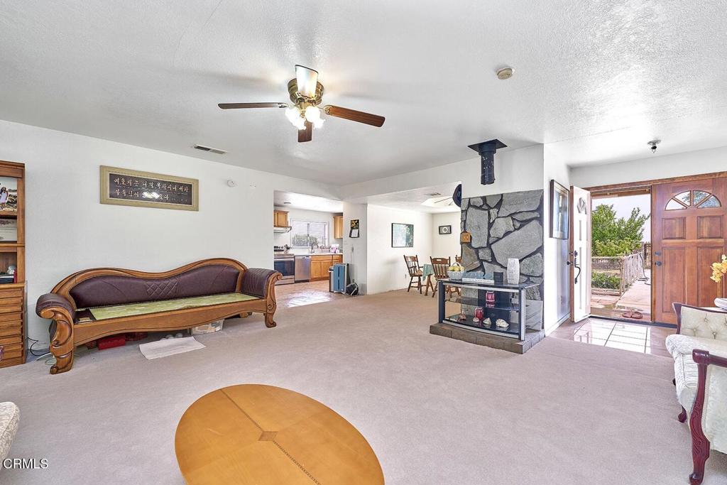 9494 Baker Road Lucerne Valley, CA 92356 - Photo 45 of 56 a bedroom with furniture and a window