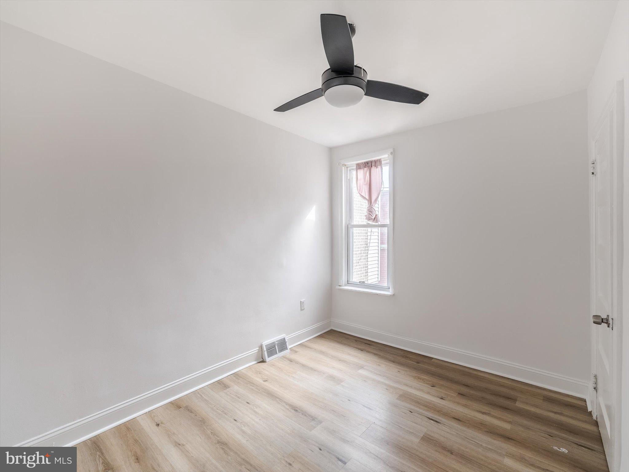 5428 Belmar Street Philadelphia, PA 19143 - Photo 17 of 25 an empty room with a window