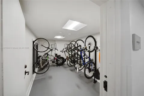 a view of a patio with a table and chairs