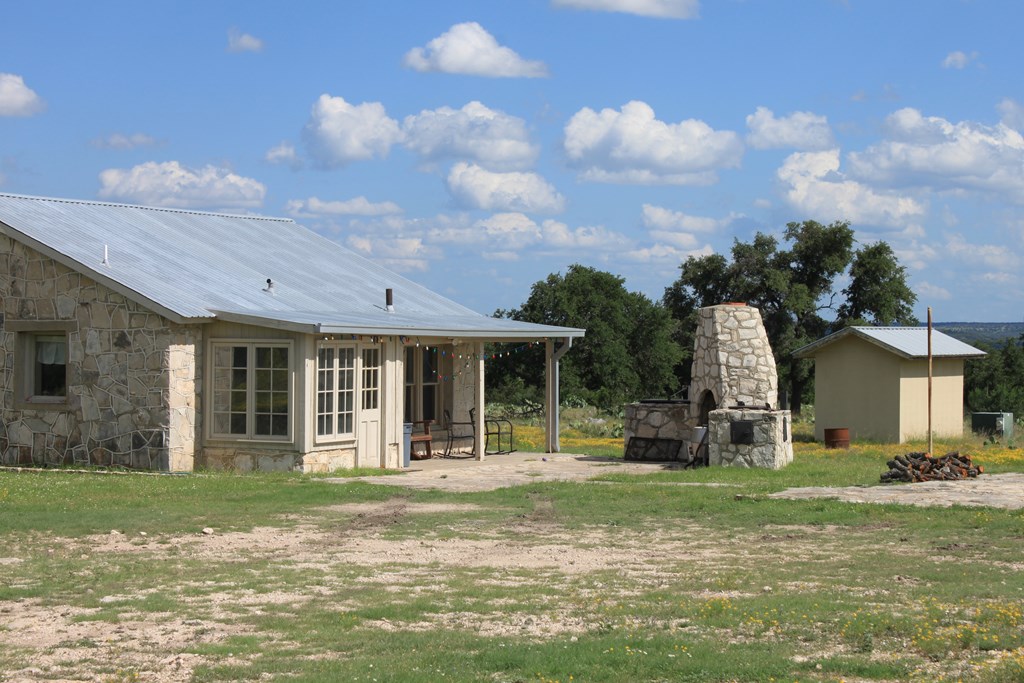 0 Other Junction Junction, TX 76849 - Photo 10 of 17 a front view of a house with garden