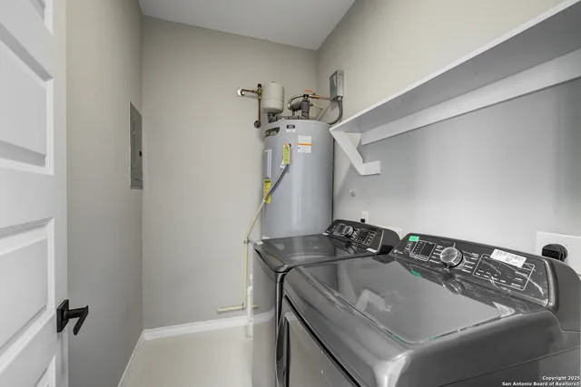 a bathroom with a sink and mirror