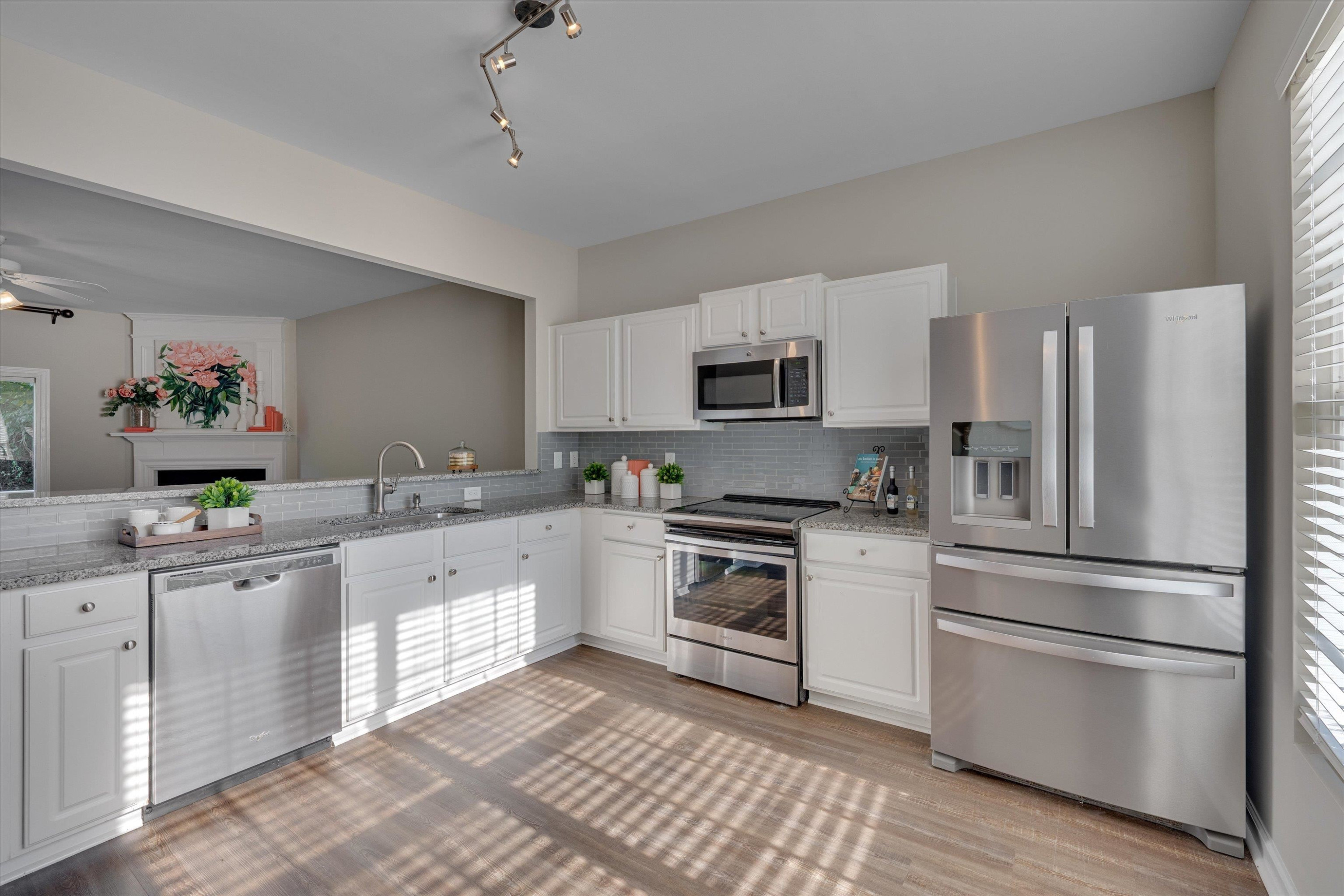 5101 Echo Ridge Road Raleigh, NC 27612 - Photo 3 of 27 LVP flooring, GRANITE Countertops, Stainless Steel Appliances! Kitchen