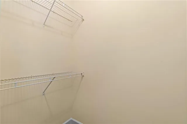 a view of a room with racks on the wall