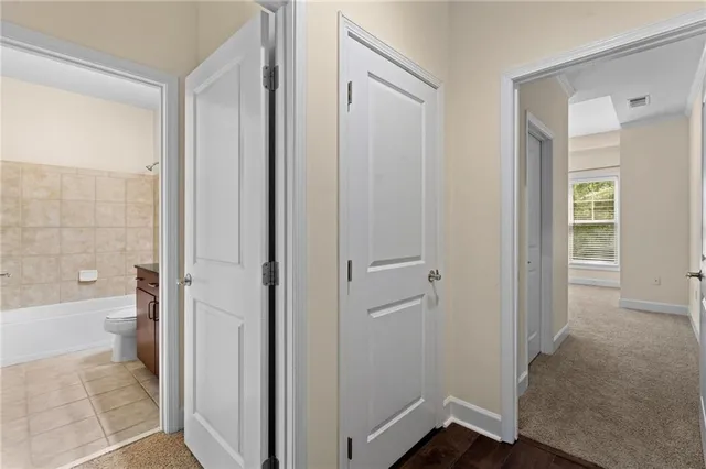 a view of a bathroom with a bathtub and a shower