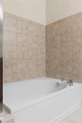 a bathroom with a bathtub