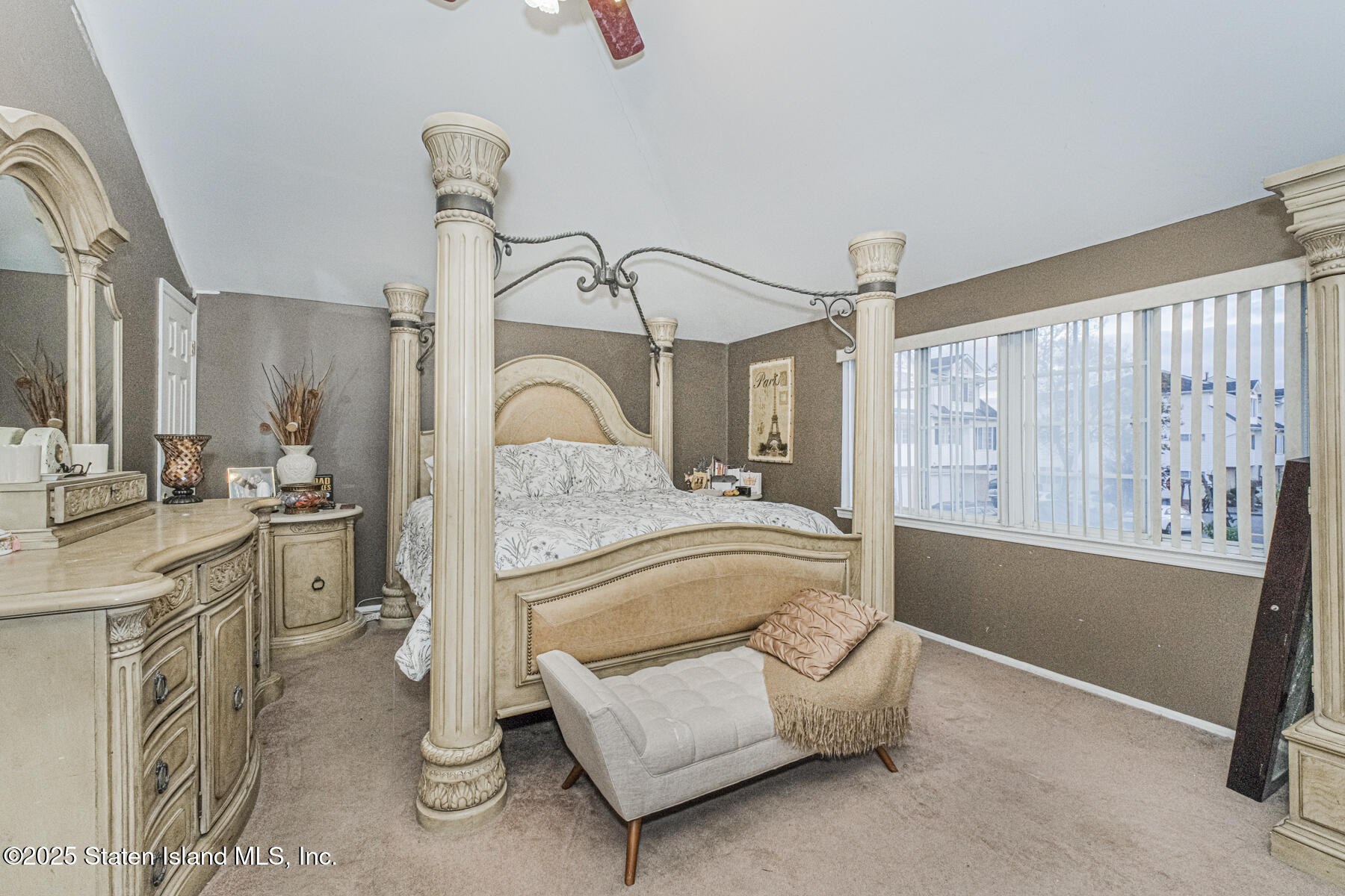122 Clay Pit Road Staten Island, NY 10309 - Photo 13 of 26 a en suite bathroom with a granite countertop sink and a mirror