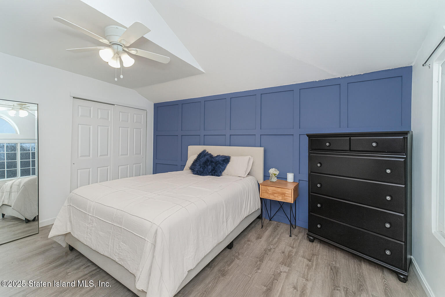 122 Clay Pit Road Staten Island, NY 10309 - Photo 16 of 26 a large white bed in a room