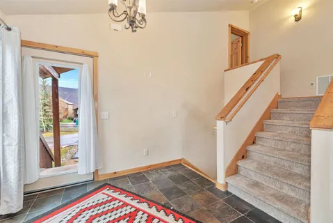 a view of an entryway with staircase