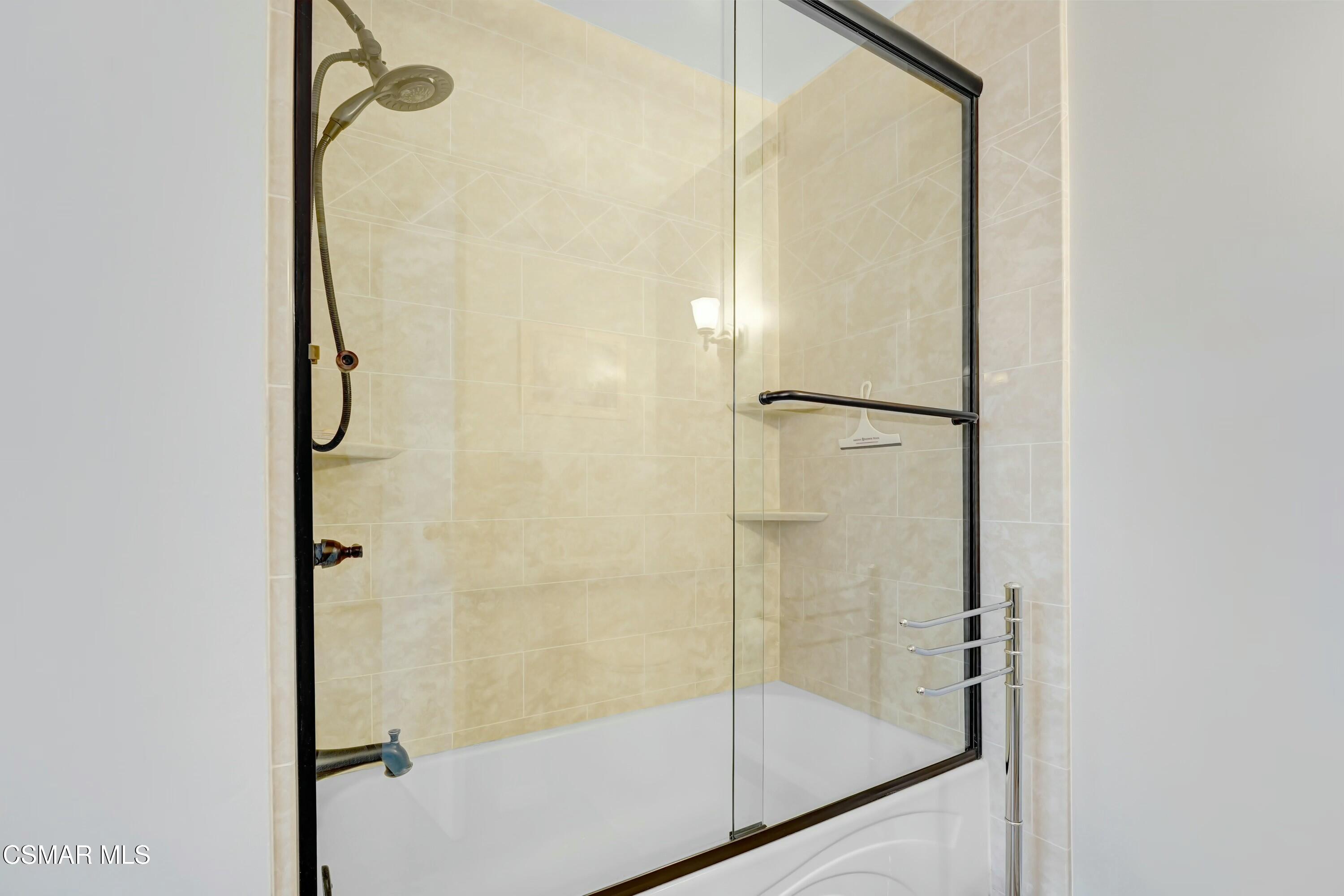 3075 Reservoir Drive Simi Valley, CA 93065 - Photo 12 of 20 a bathroom with a glass shower door