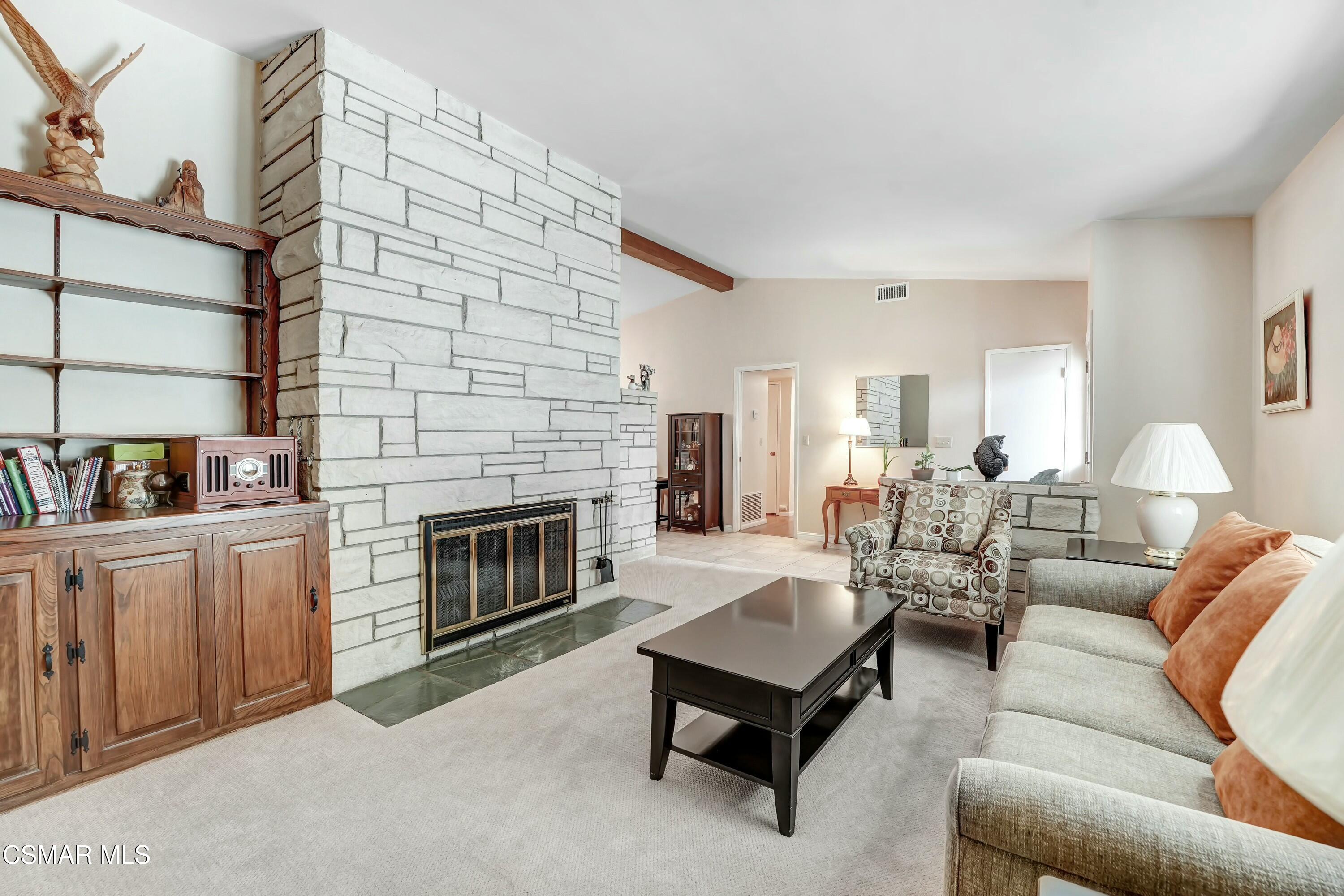 3075 Reservoir Drive Simi Valley, CA 93065 - Photo 3 of 20 a living room with furniture and a fireplace