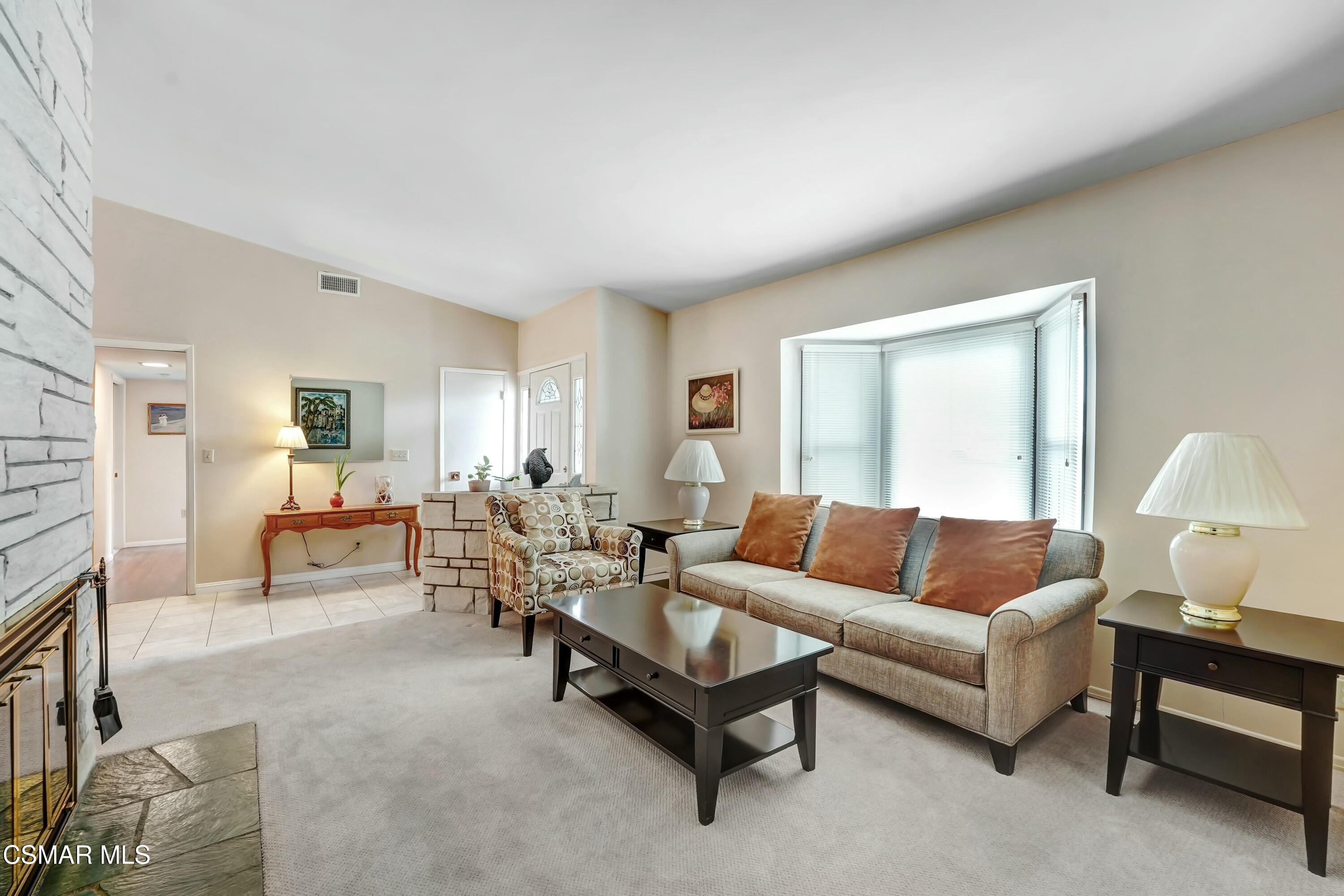 3075 Reservoir Drive Simi Valley, CA 93065 - Photo 4 of 20 a living room with furniture and a large window