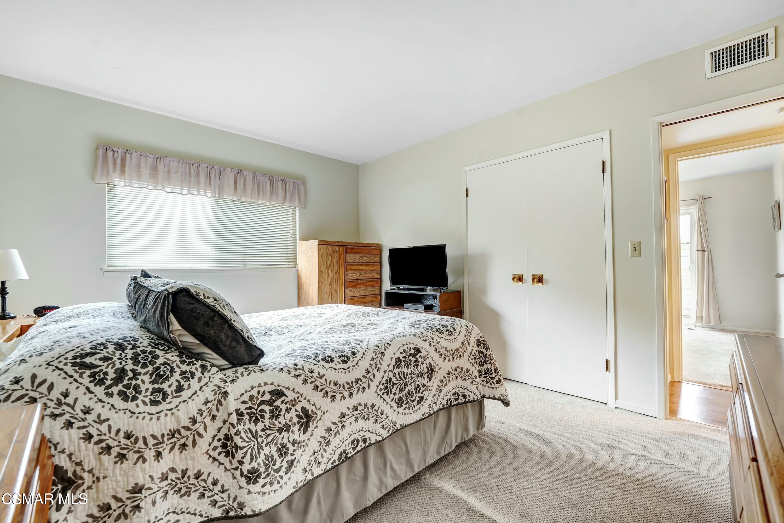 3075 Reservoir Drive Simi Valley, CA 93065 - Photo 9 of 20 a bedroom with a bed and a television