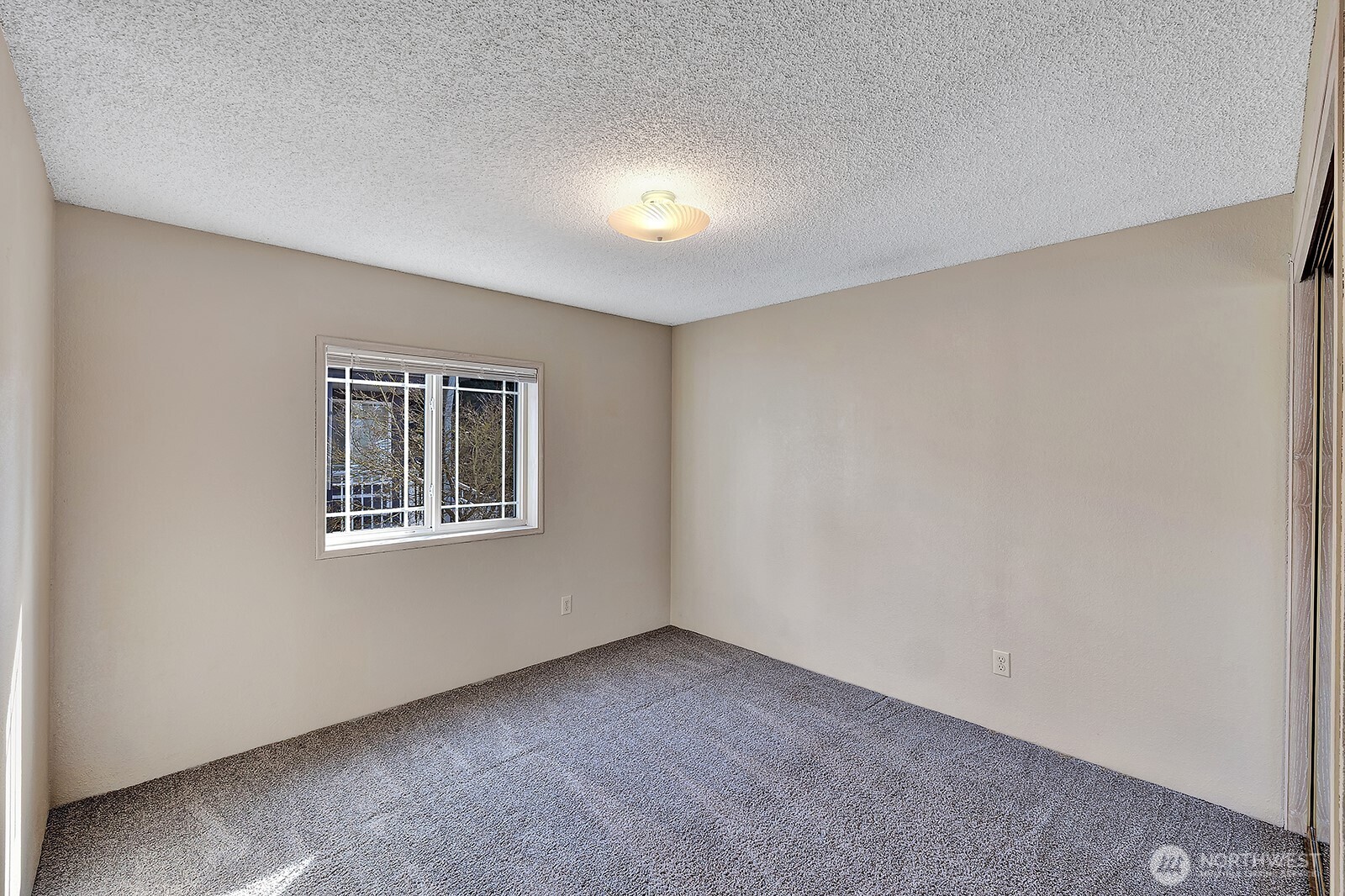 2611 South 288th Street, Unit 2 Federal Way, WA 98003 - Photo 13 of 22 a view of an empty room with a window