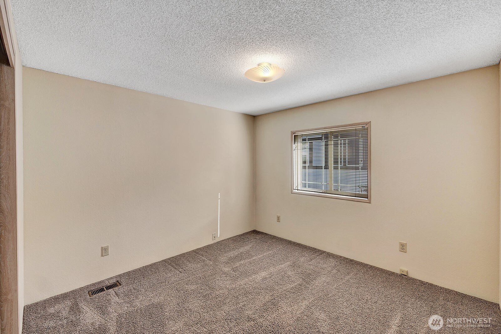 2611 South 288th Street, Unit 2 Federal Way, WA 98003 - Photo 14 of 22 a view of an empty room with a window