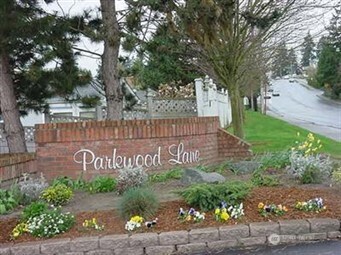 2611 South 288th Street, Unit 2 Federal Way, WA 98003 - Photo 18 of 22 a sign of golf club on a stone wall