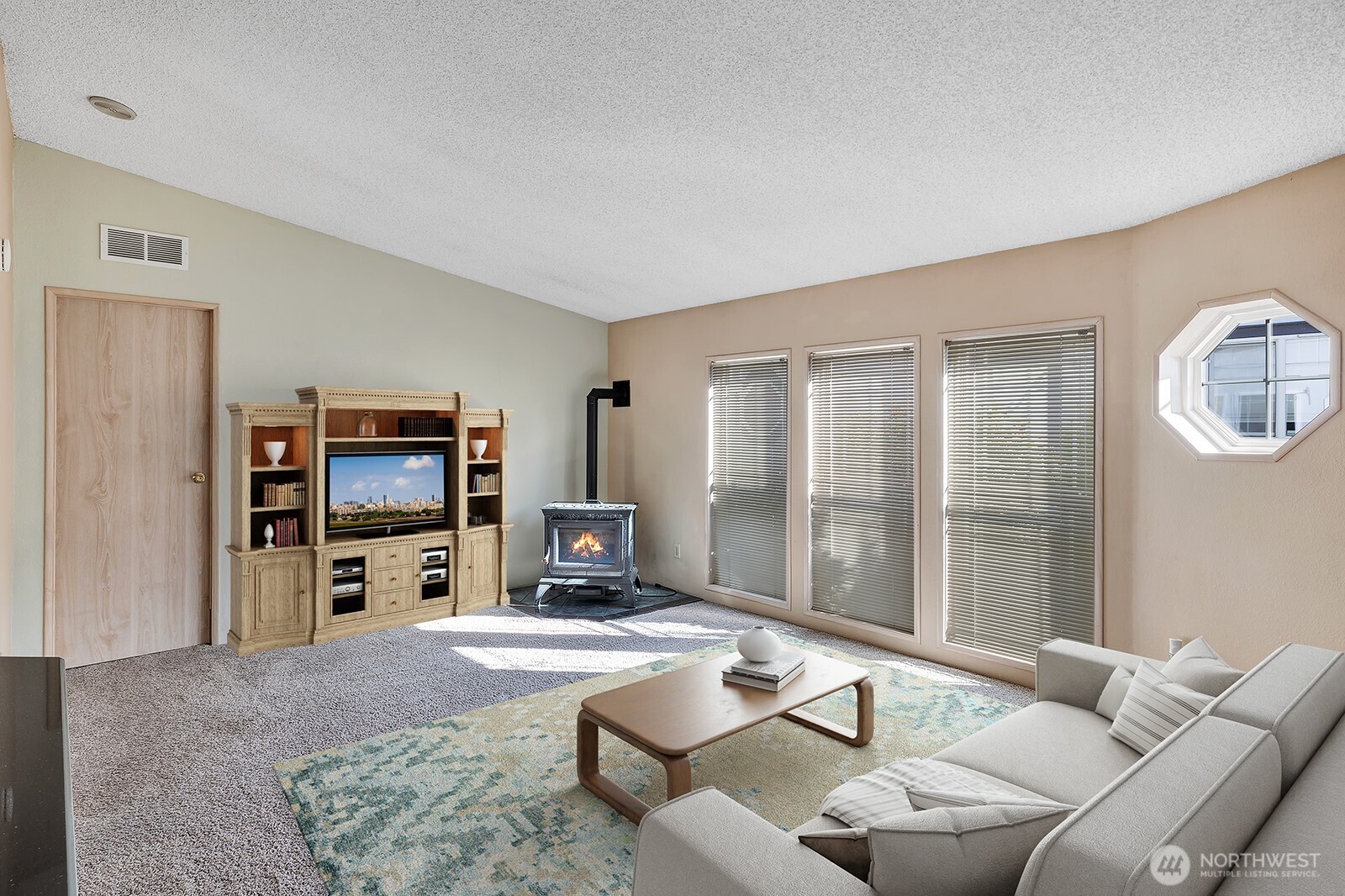 2611 South 288th Street, Unit 2 Federal Way, WA 98003 - Photo 4 of 22 a living room with furniture and a flat screen tv