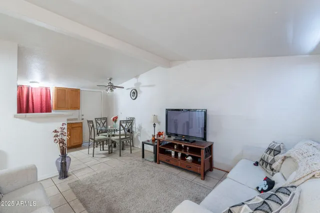 a living room with furniture and a couch