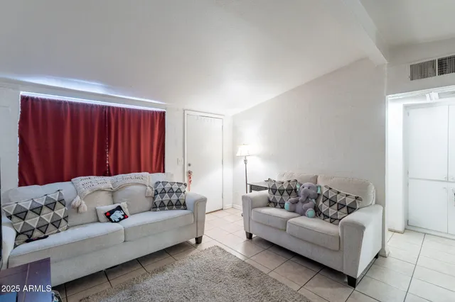 a view of a workspace with furniture