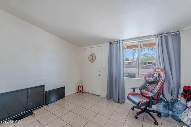 a kitchen that has a sink and a stove