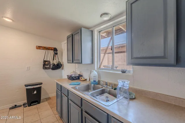 a white toilet sitting next to a shower curtain