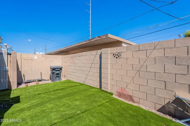 a view of street with parked cars