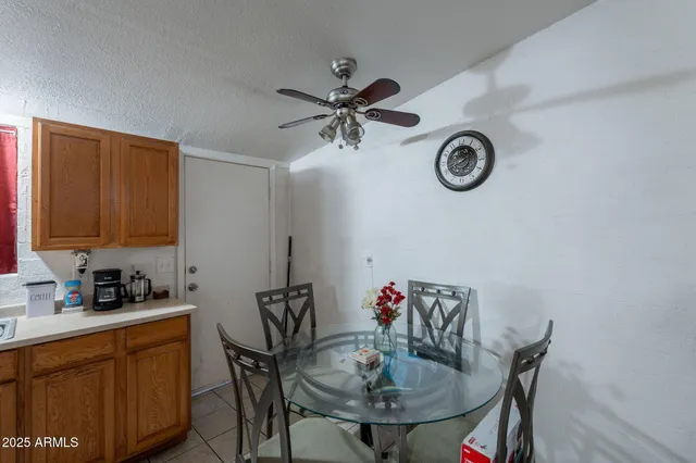 a kitchen with a sink stove and refrigerator