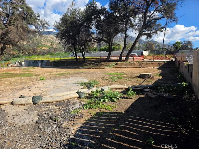 a view of a yard with an outdoor space