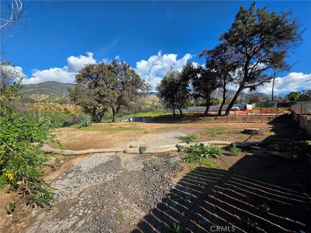 a view of a yard with an outdoor space