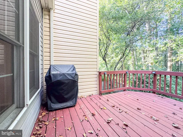 a view of balcony with wooden floor