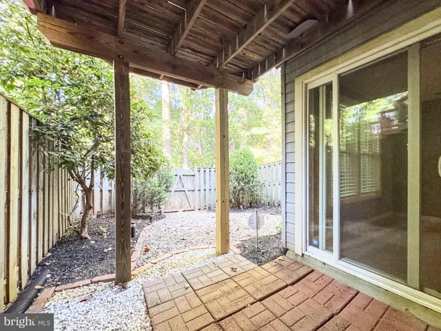 a view of backyard with green space