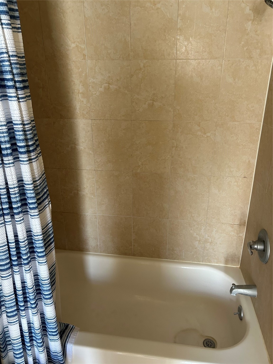 23119 Tree Bright Lane Spring, TX 77373 - Photo 11 of 17 a bathroom with a bathtub